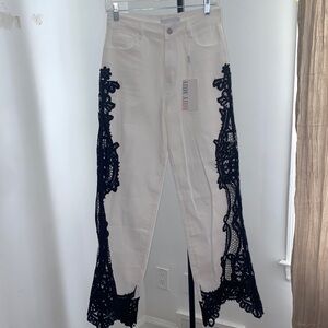 Elegant Jeans with Black Lace Detailing